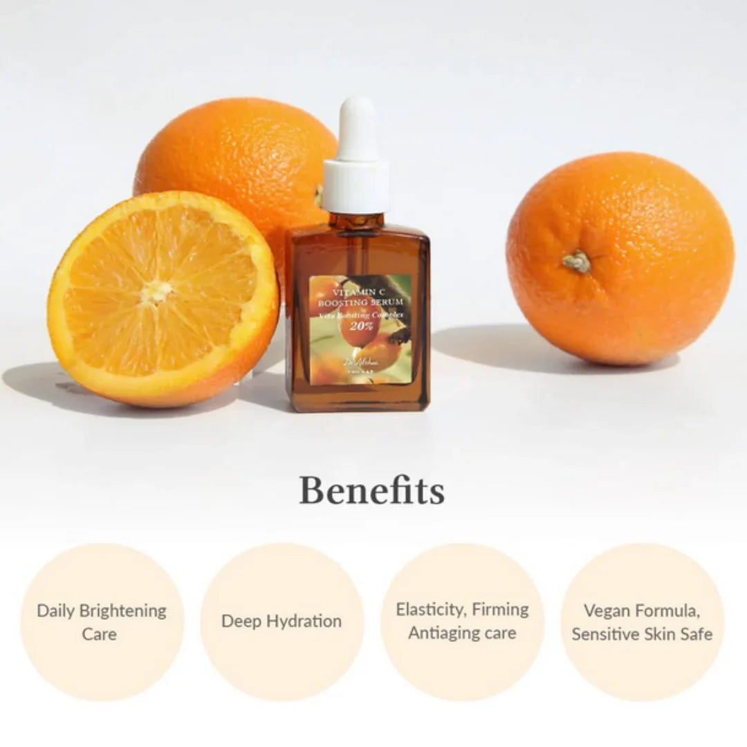 Vitamin C Boosting Serum bottle with dropper, surrounded by fresh oranges, highlighting daily brightening and deep hydration benefits