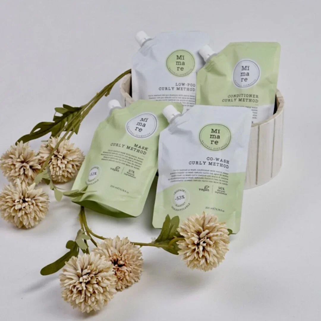 Mimare Curly Method hair care pouches including low-poo, conditioner, mask, and co-wash with beige flowers and white container
