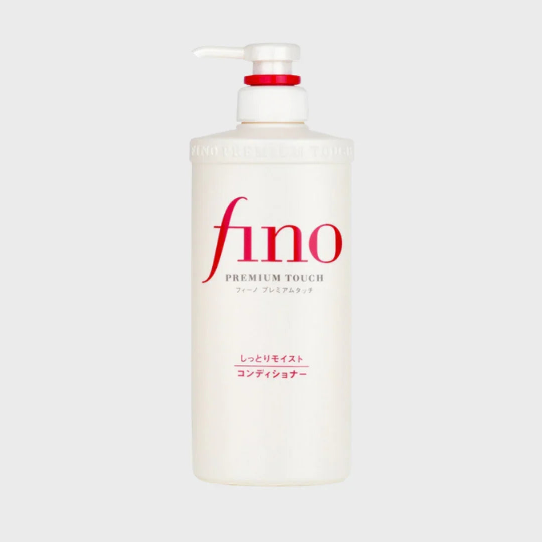 Fino Premium Touch Moist Conditioner white pump bottle with red and black text on plain background